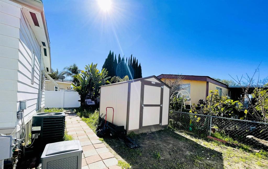 4660 North River Road, Unit 95 Oceanside, CA 92057 - Photo 23 of 37 a view of a backyard with sitting area