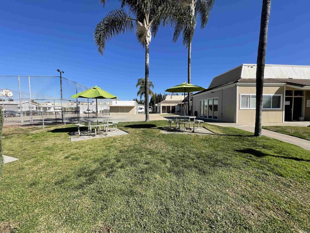 4660 North River Road, Unit 95 Oceanside, CA 92057 - Photo 35 of 37 a view of a house with swimming pool