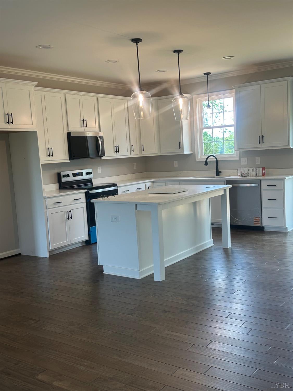1493 Buck Crk Road Appomattox, VA 24522 - Photo 13 of 18 a kitchen with stainless steel appliances granite countertop a stove top oven a sink dishwasher and a refrigerator
