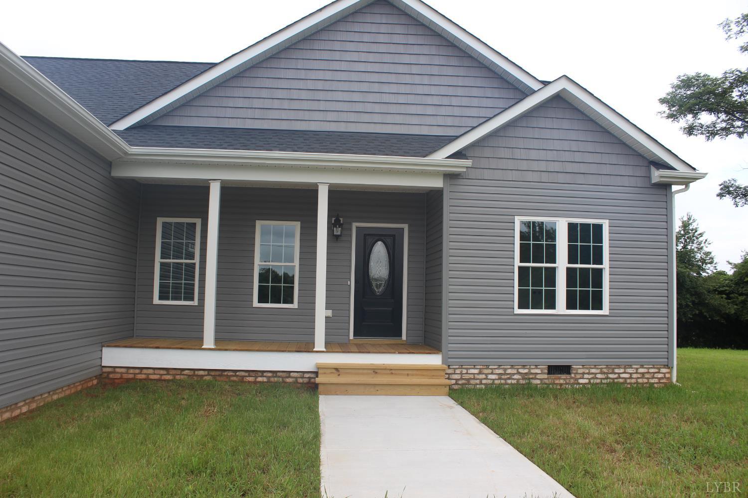 1493 Buck Crk Road Appomattox, VA 24522 - Photo 5 of 18 a view of a house with a swimming pool and a yard