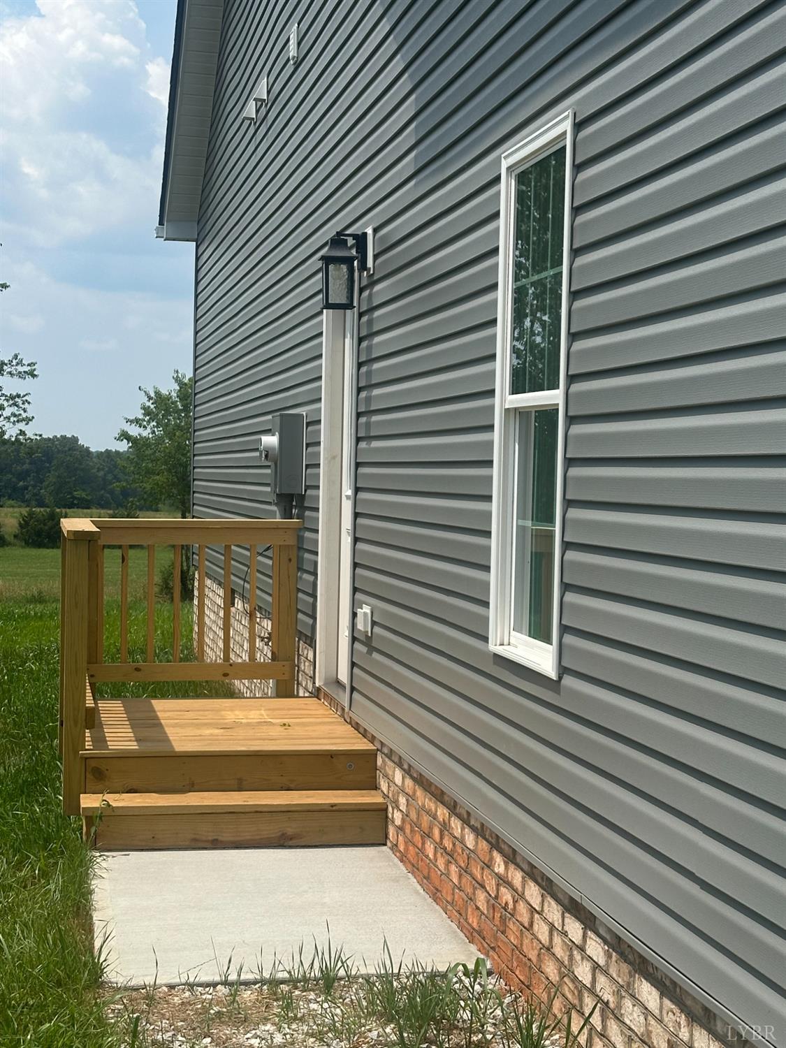 1493 Buck Crk Road Appomattox, VA 24522 - Photo 10 of 18 a view of backyard with a balcony
