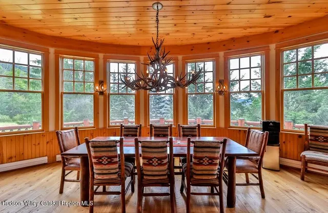 a view of an chairs and table in the balcony