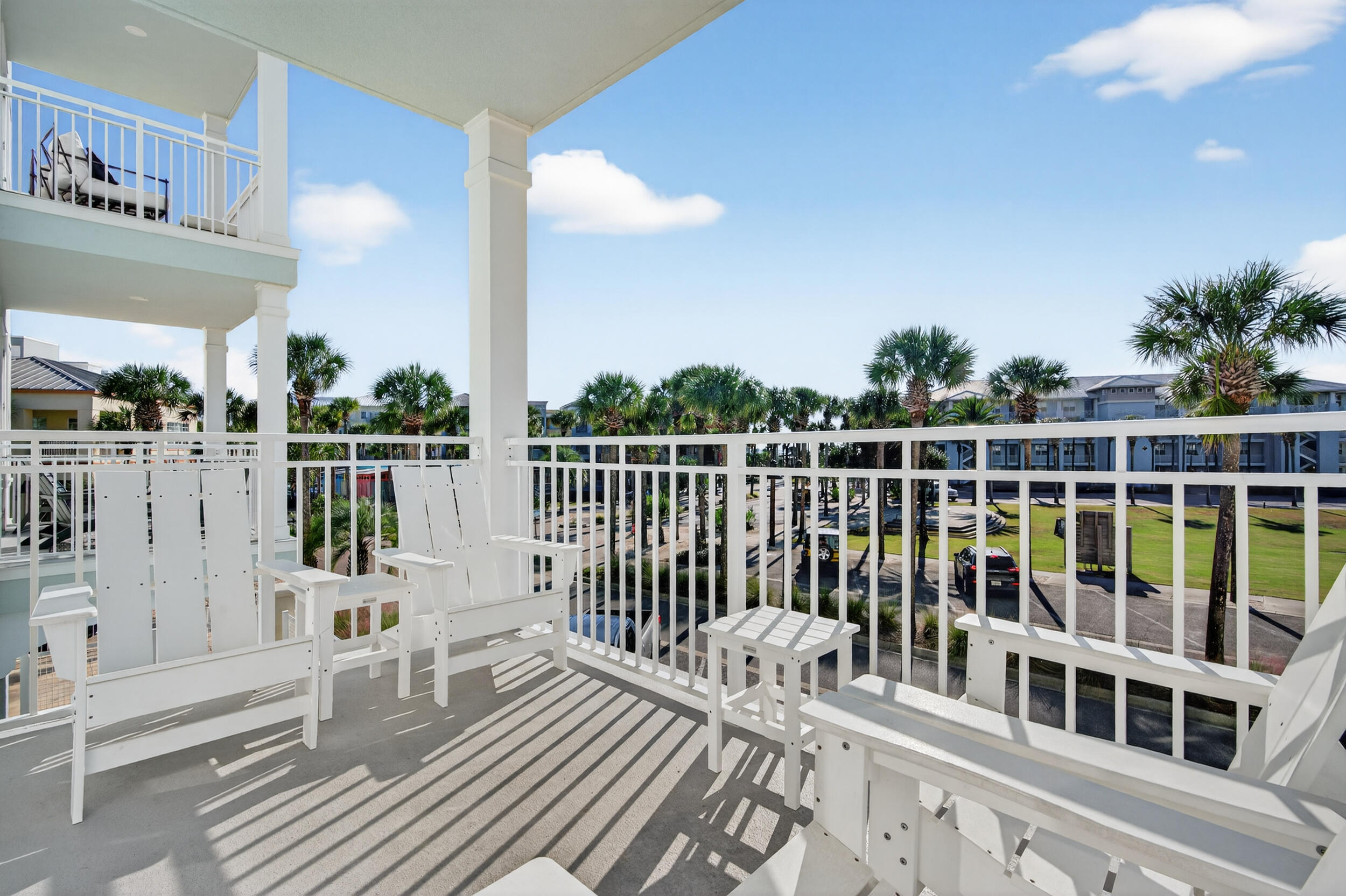 1740 South Co Highway 393, Unit 103 Santa Rosa Beach, FL 32459 - Photo 18 of 73 a view of a balcony with wooden floor and fence