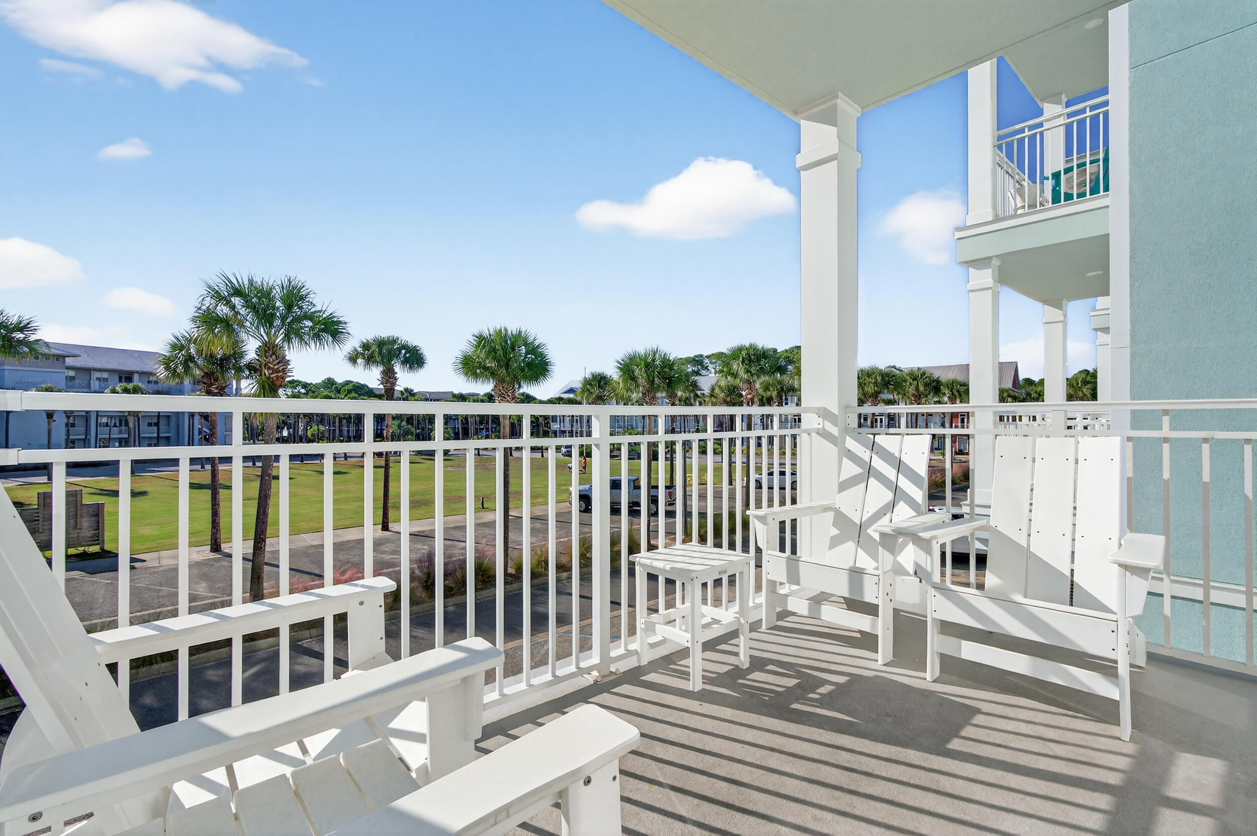 1740 South Co Highway 393, Unit 103 Santa Rosa Beach, FL 32459 - Photo 19 of 73 a view of a balcony with wooden floor and fence