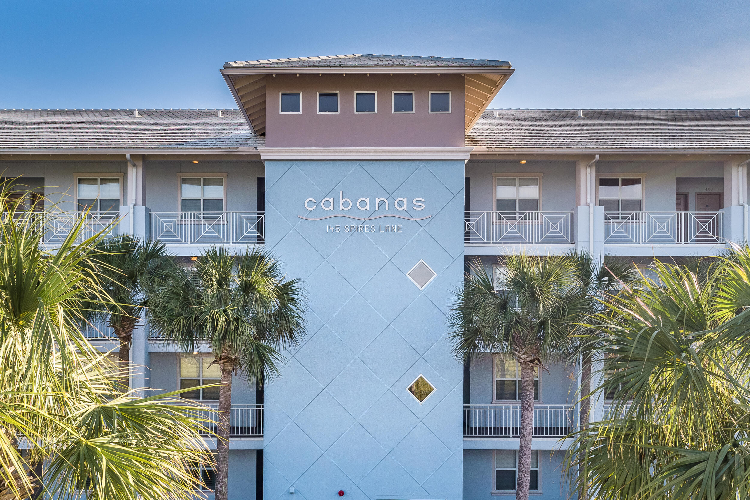1740 South Co Highway 393, Unit 103 Santa Rosa Beach, FL 32459 - Photo 31 of 73 a front view of a house with a yard