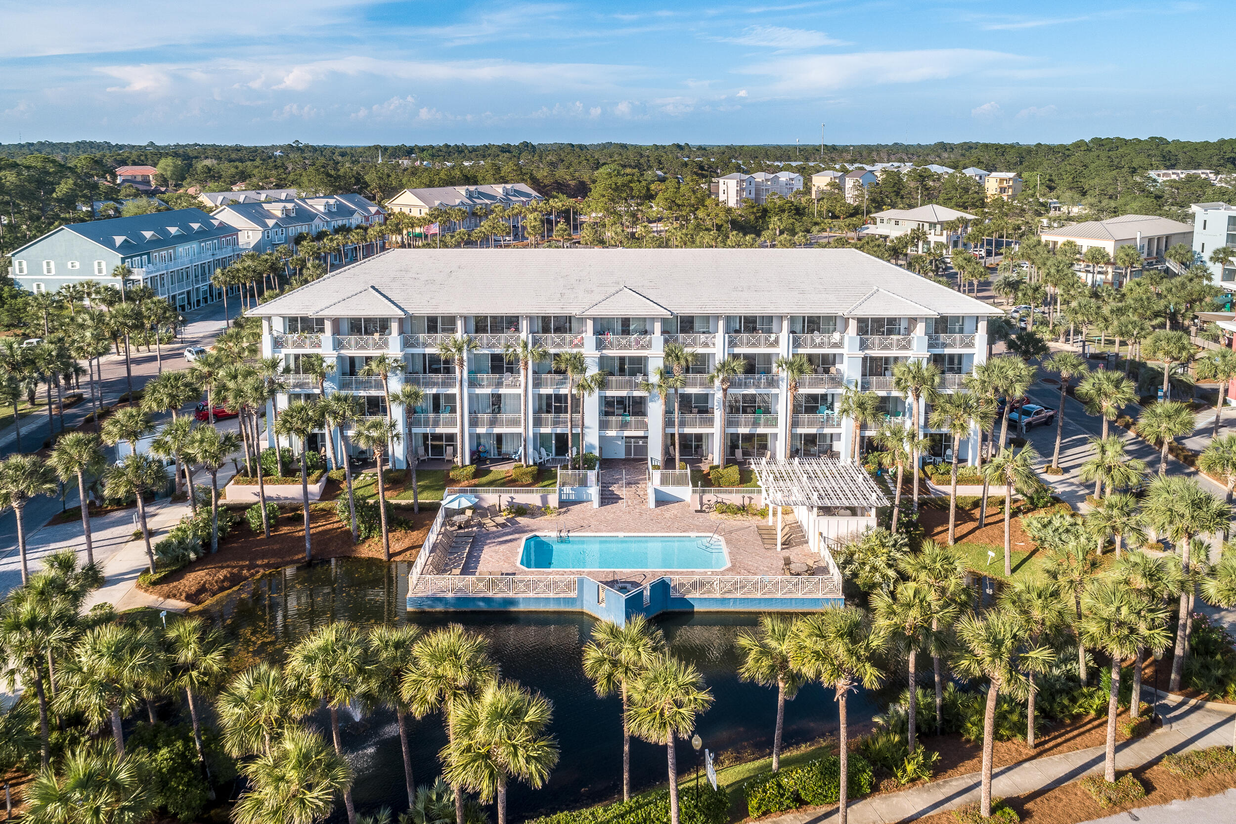 1740 South Co Highway 393, Unit 103 Santa Rosa Beach, FL 32459 - Photo 32 of 73 a view of a large building with a outdoor space