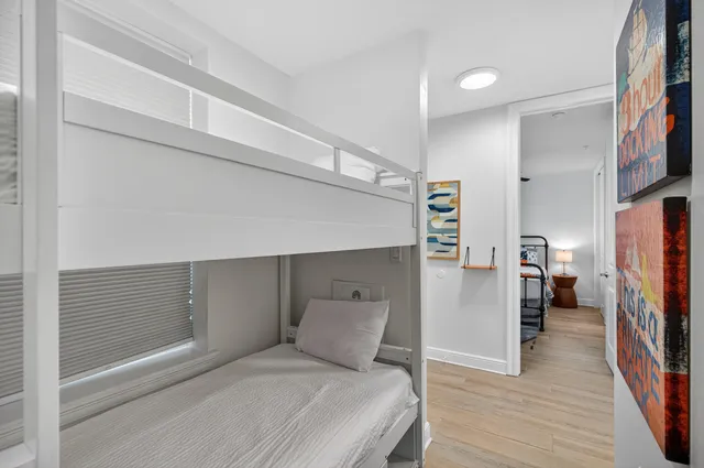 a bathroom with a toilet sink and shower