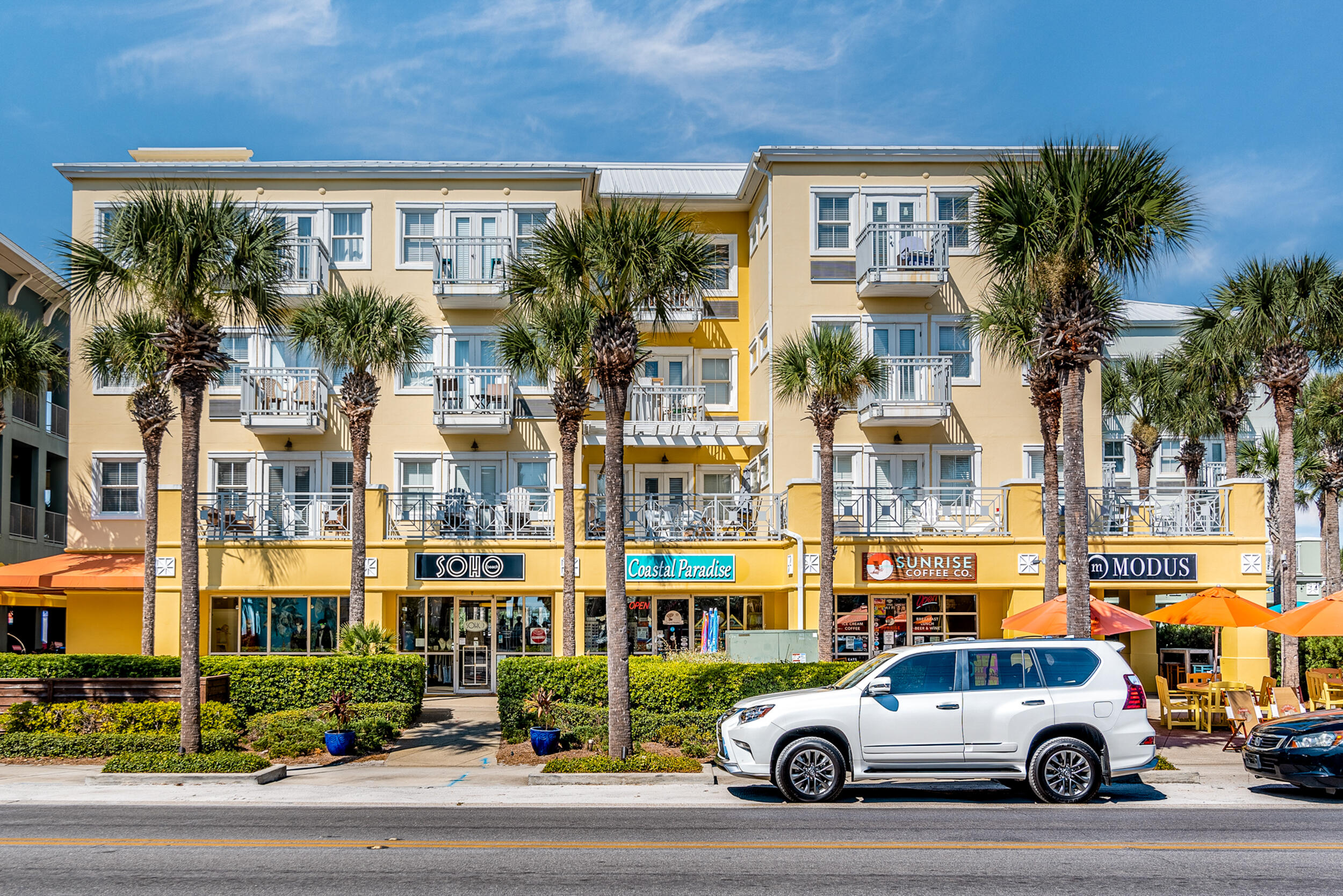 1740 South Co Highway 393, Unit 103 Santa Rosa Beach, FL 32459 - Photo 61 of 73 a car parked in front of a building