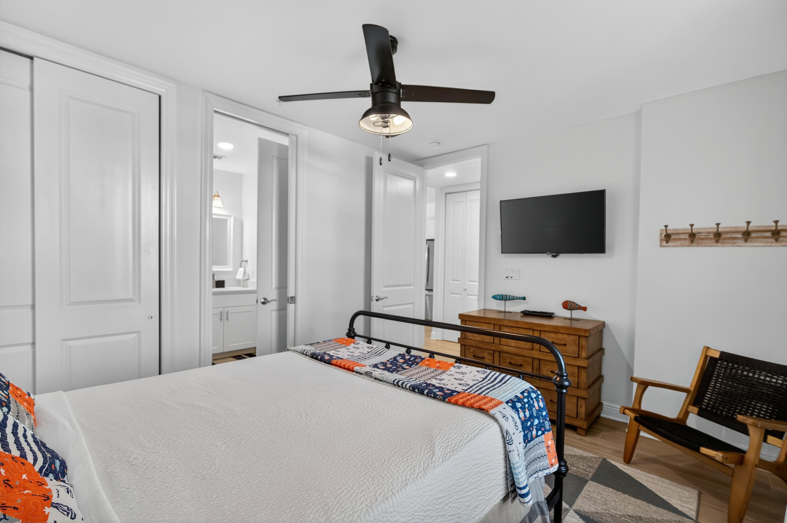 1740 South Co Highway 393, Unit 103 Santa Rosa Beach, FL 32459 - Photo 7 of 73 a bedroom with a bed a desk and chair