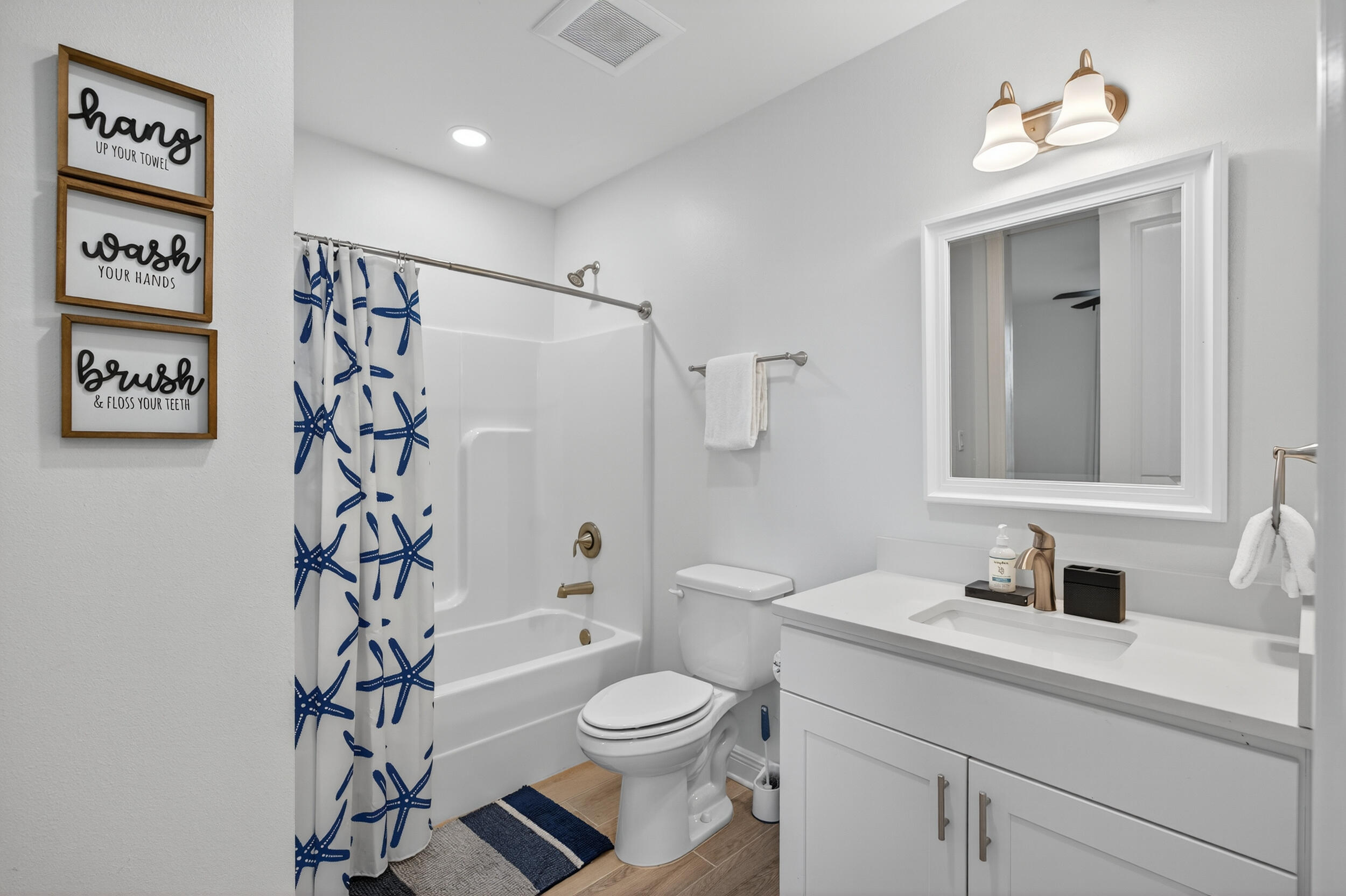 1740 South Co Highway 393, Unit 103 Santa Rosa Beach, FL 32459 - Photo 8 of 73 a bathroom with a toilet sink and shower