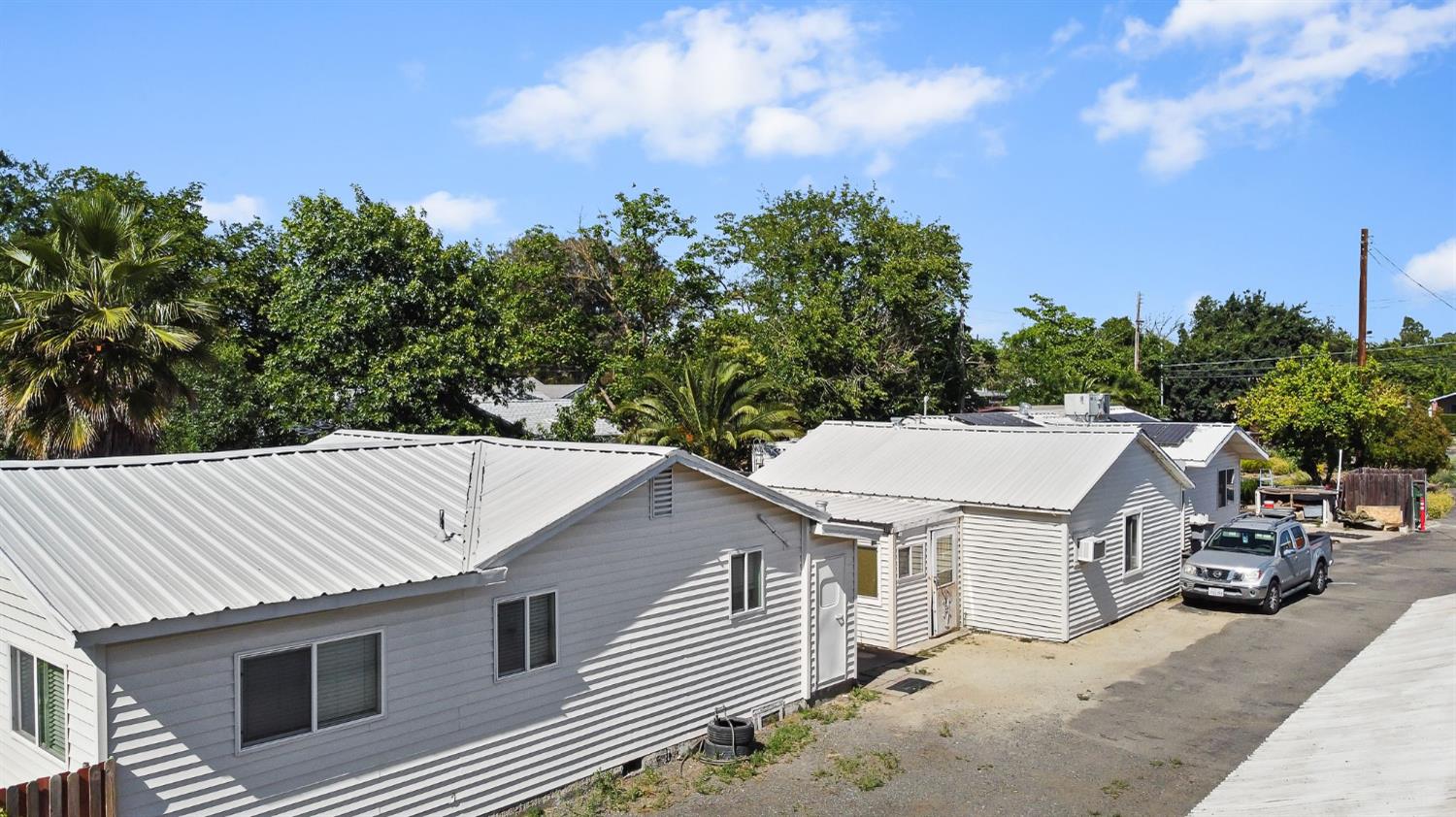 a aerial view of a house with a yard
