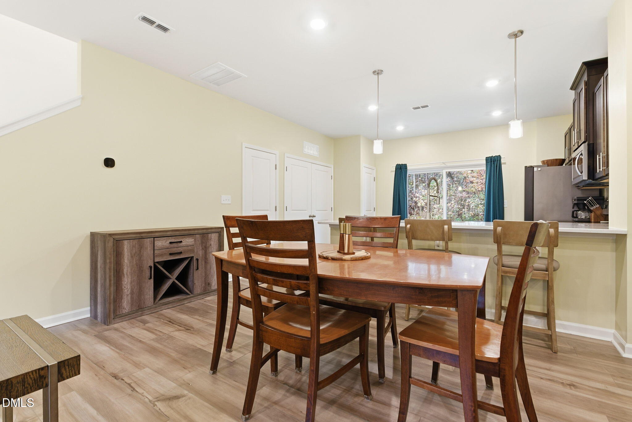 449 Hacksaw Trail Raleigh, NC 27610 - Photo 10 of 36 a view of a dining room with furniture