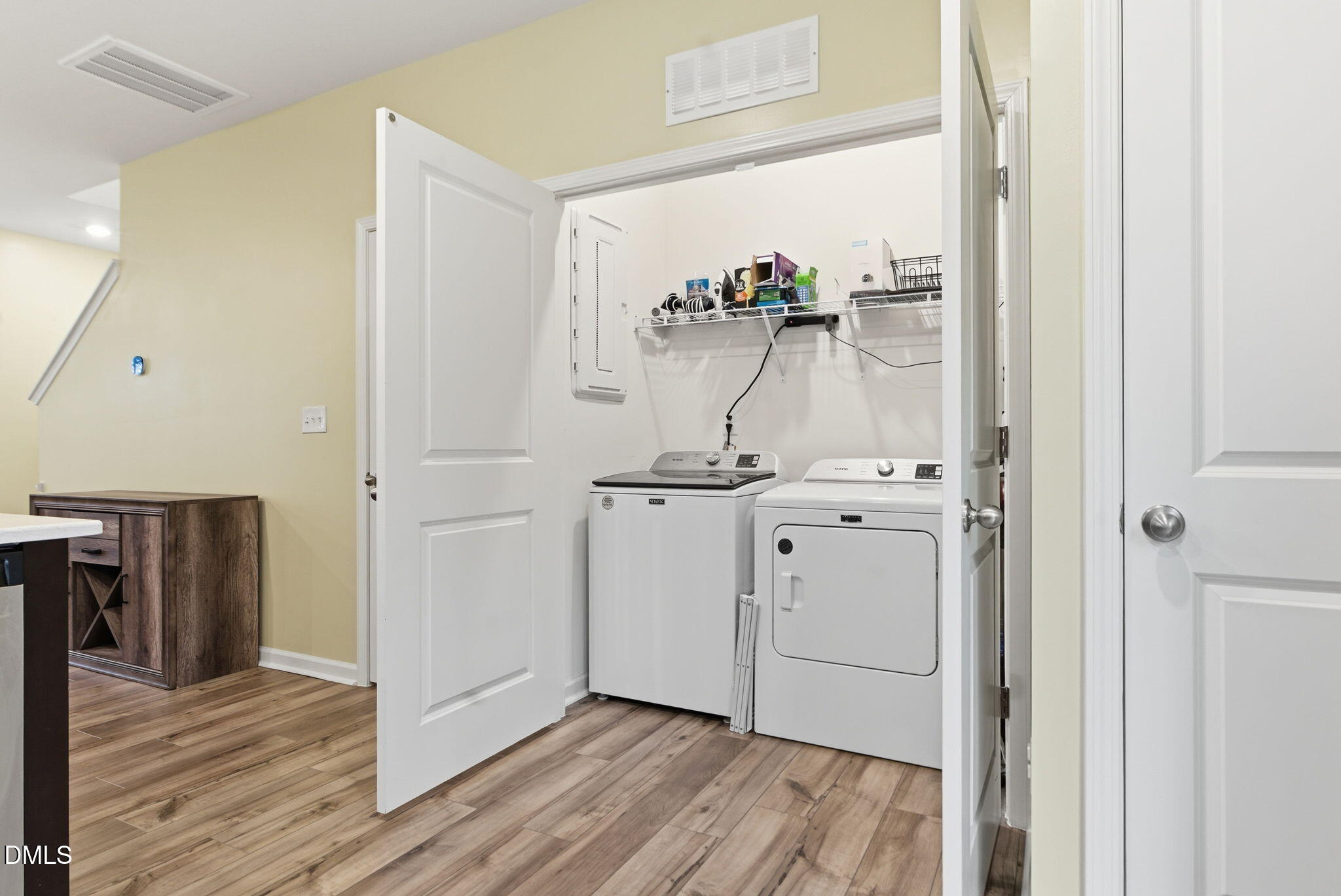 449 Hacksaw Trail Raleigh, NC 27610 - Photo 16 of 36 a view of a hallway with wooden floor