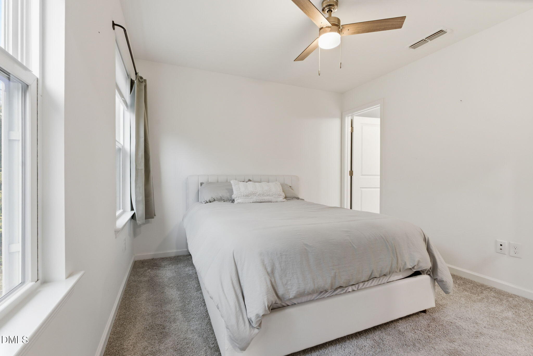 449 Hacksaw Trail Raleigh, NC 27610 - Photo 19 of 36 a bedroom with a bed and a window