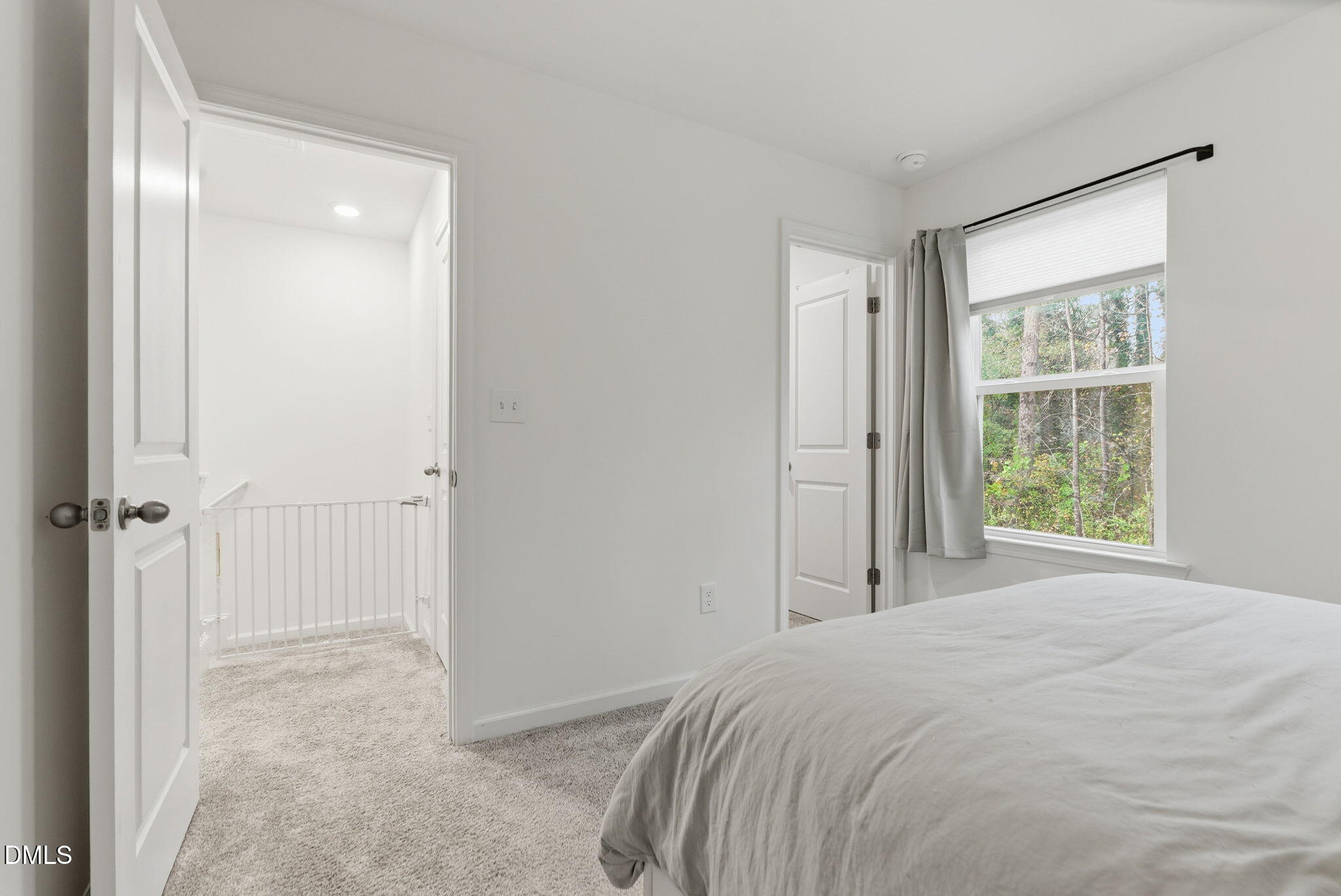 449 Hacksaw Trail Raleigh, NC 27610 - Photo 20 of 36 a view of a bedroom with closet and windows