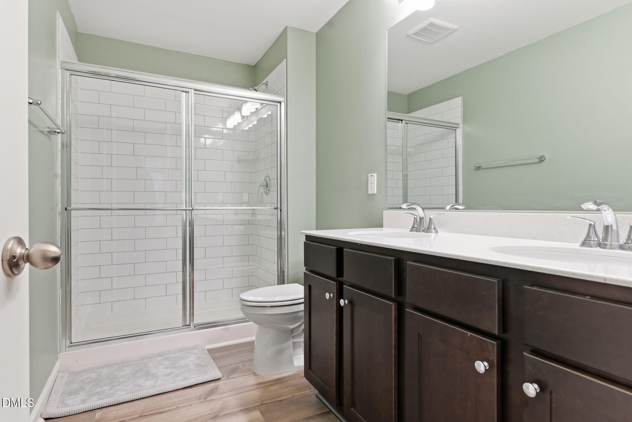 449 Hacksaw Trail Raleigh, NC 27610 - Photo 22 of 36 a bathroom with a sink a toilet and shower