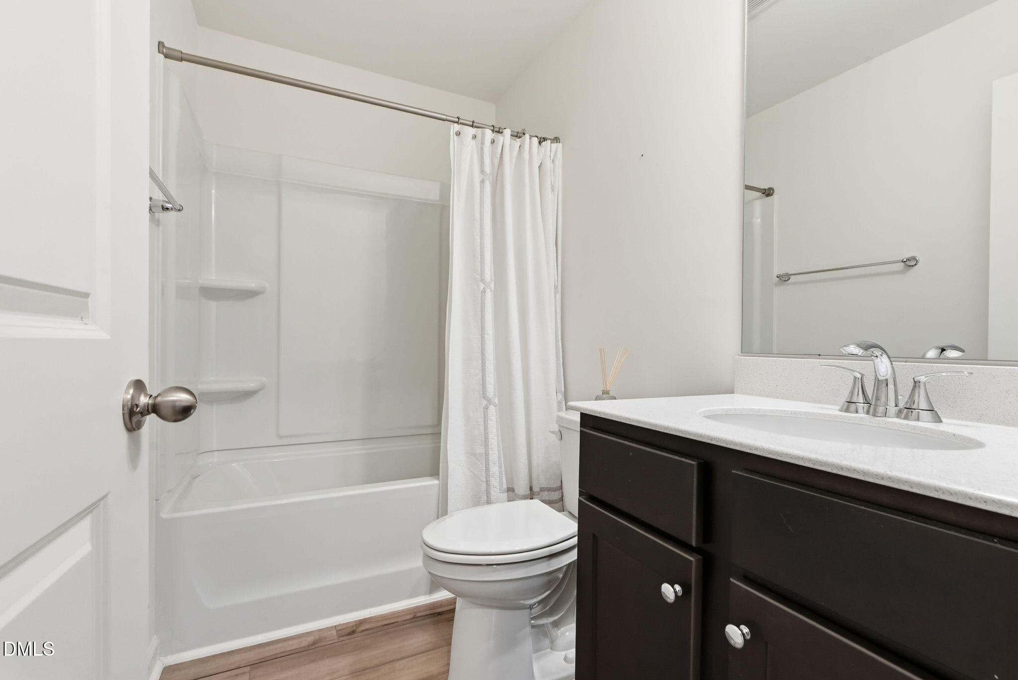 449 Hacksaw Trail Raleigh, NC 27610 - Photo 27 of 36 a bathroom with a sink a toilet and shower