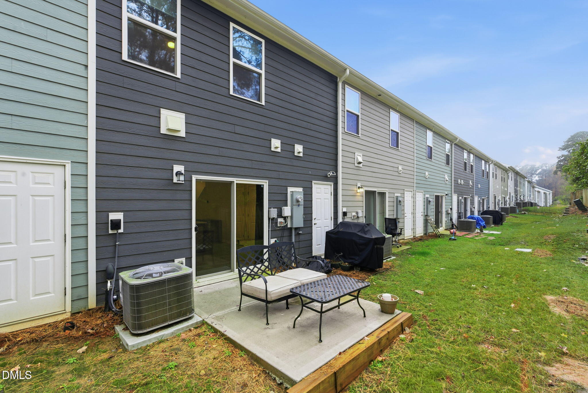449 Hacksaw Trail Raleigh, NC 27610 - Photo 28 of 36 a building outdoor space with patio furniture