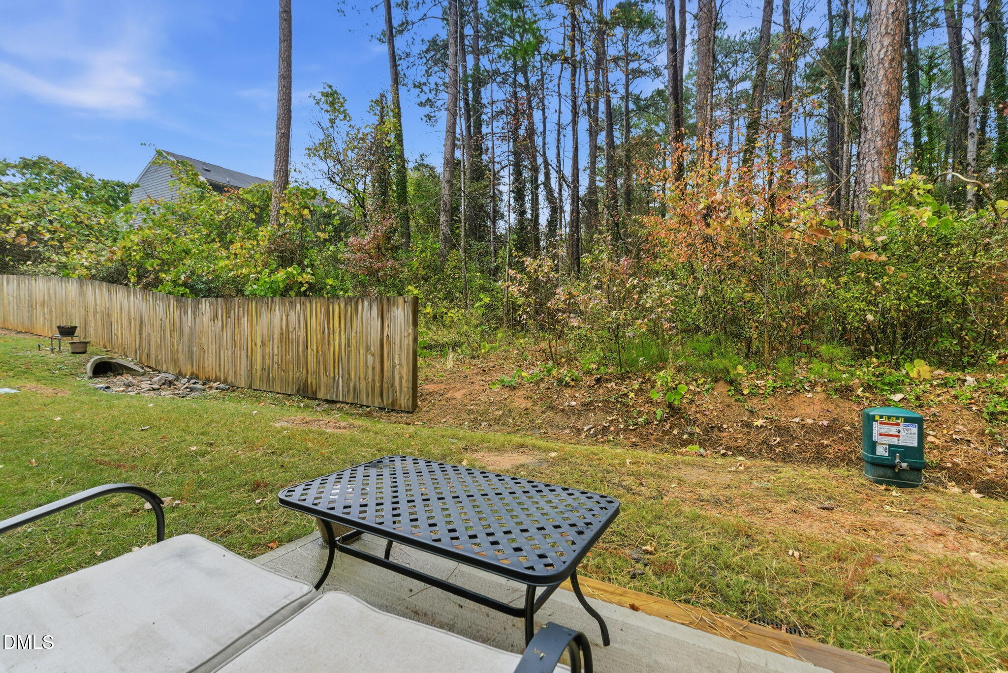 449 Hacksaw Trail Raleigh, NC 27610 - Photo 2 of 36 a view of a backyard with sitting area