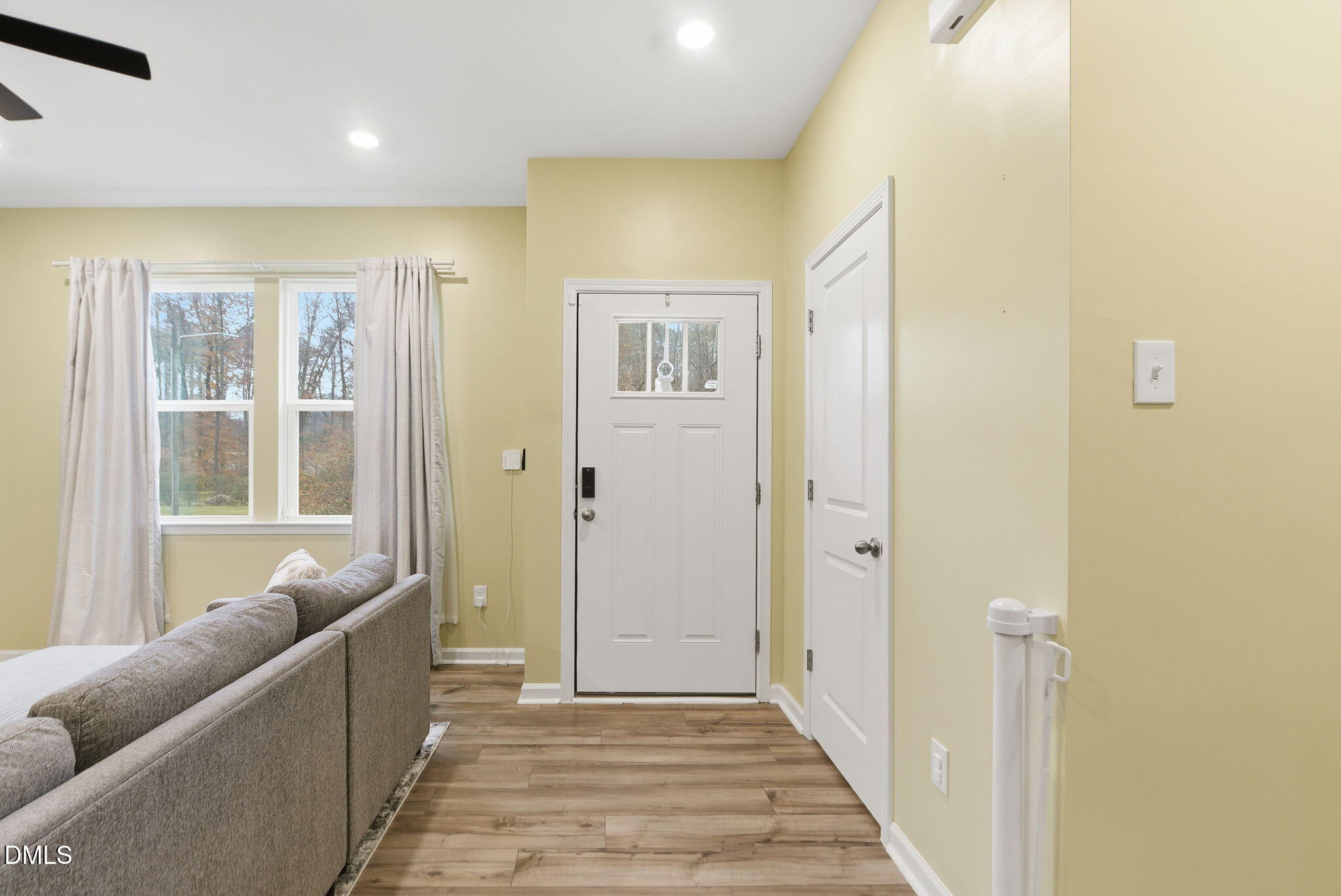 449 Hacksaw Trail Raleigh, NC 27610 - Photo 5 of 36 a living room with furniture and windows