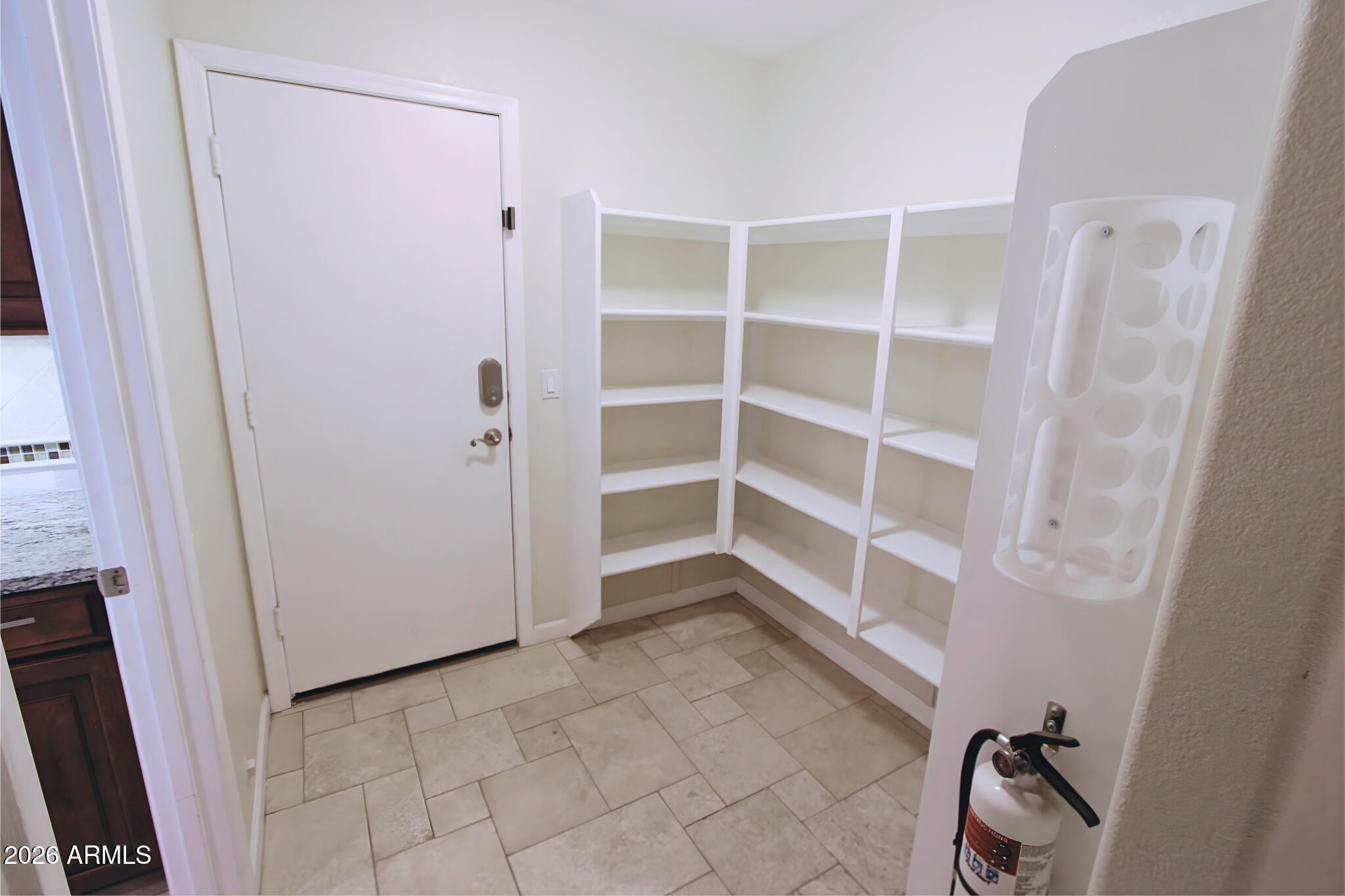 1250 South Palm Street Gilbert, AZ 85296 - Photo 11 of 33 a view of an empty walk in closet