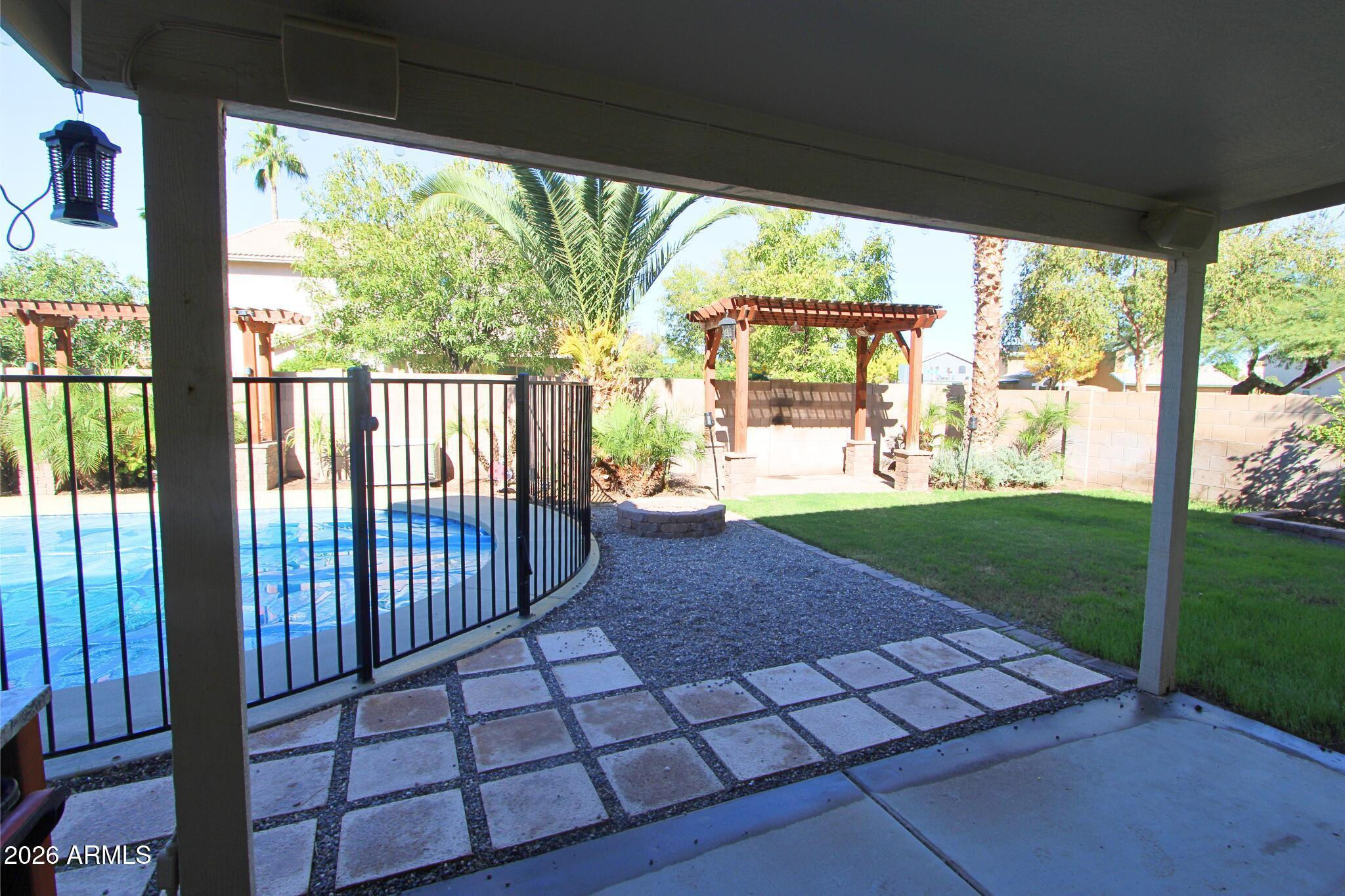 1250 South Palm Street Gilbert, AZ 85296 - Photo 17 of 33 a view of a porch with backyard