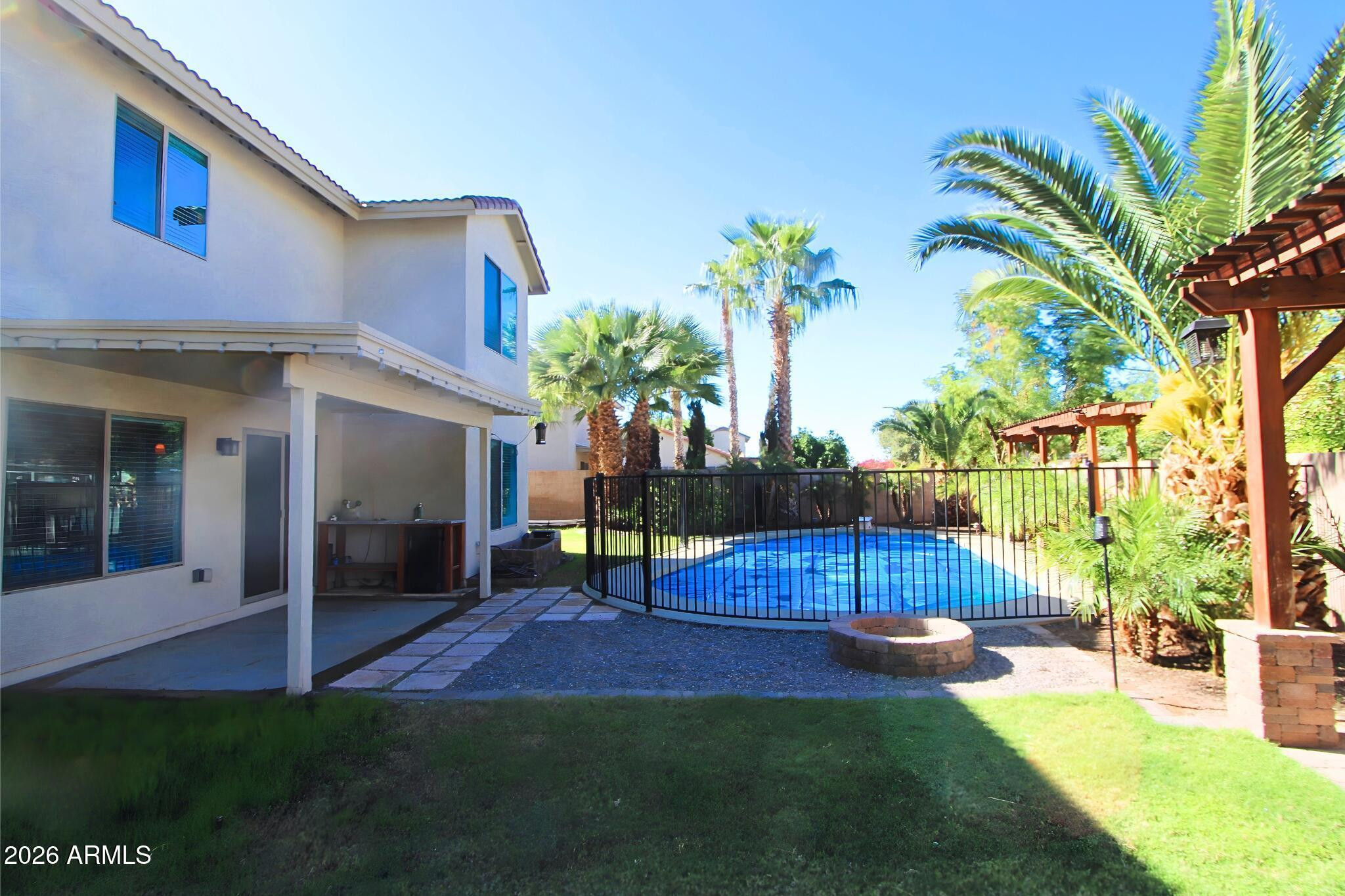 1250 South Palm Street Gilbert, AZ 85296 - Photo 22 of 33 a view of a house with a patio