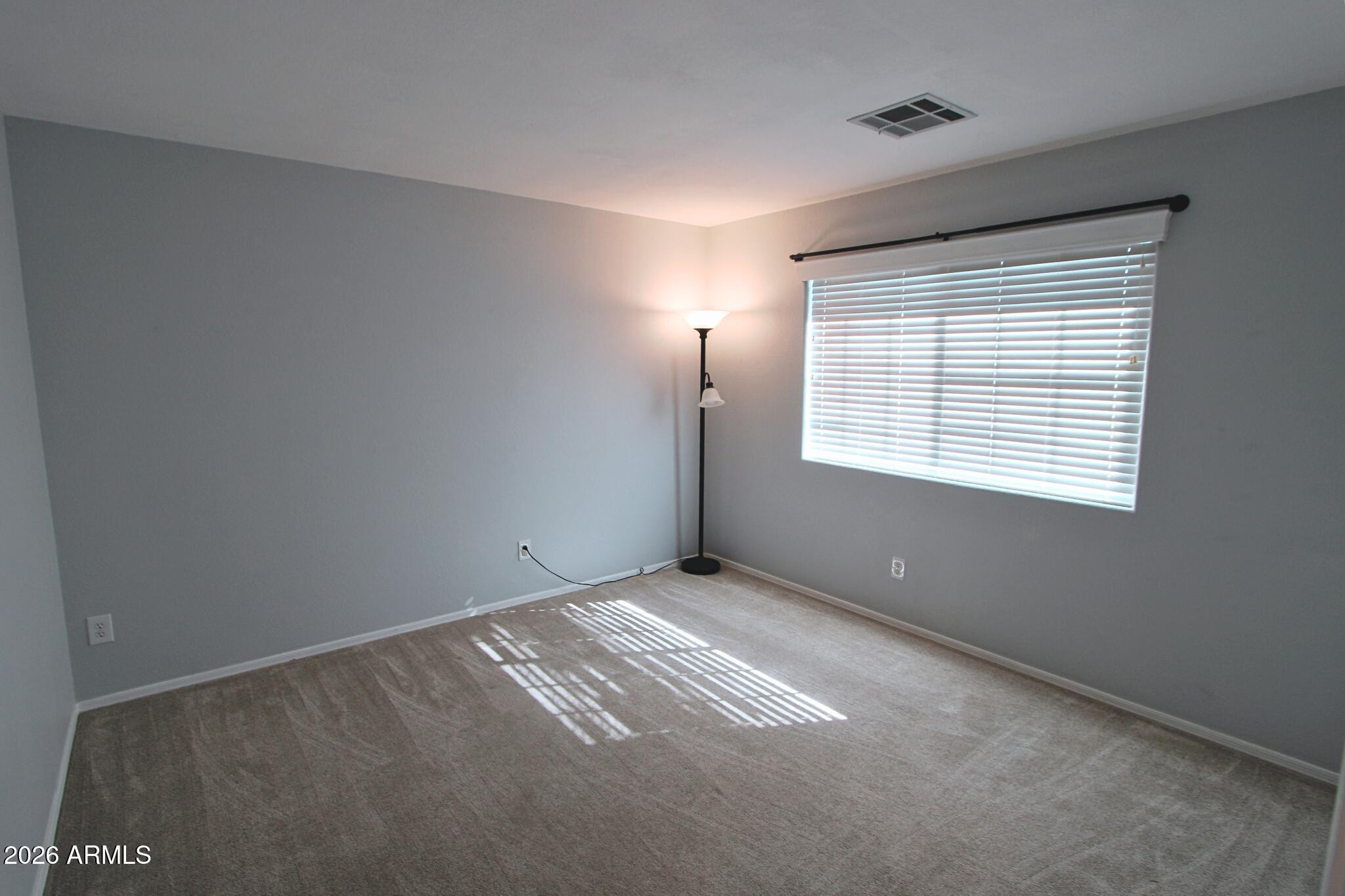 1250 South Palm Street Gilbert, AZ 85296 - Photo 33 of 33 a view of an empty room with a window