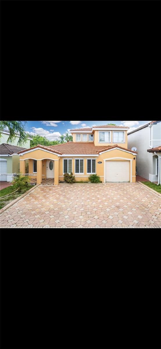 16453 Southwest 97th Street Miami, FL 33196 - Photo 3 of 5 a view of a city from a balcony