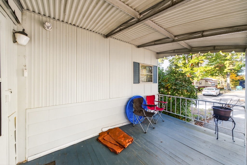 59 Timber Lane Wareham, MA 02576 - Photo 13 of 30 a living room with furniture and a wooden floor