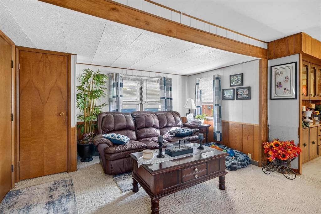 59 Timber Lane Wareham, MA 02576 - Photo 16 of 30 a living room with furniture and a window