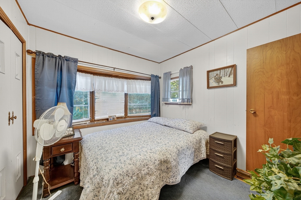 59 Timber Lane Wareham, MA 02576 - Photo 23 of 30 a bedroom with a bed and a window