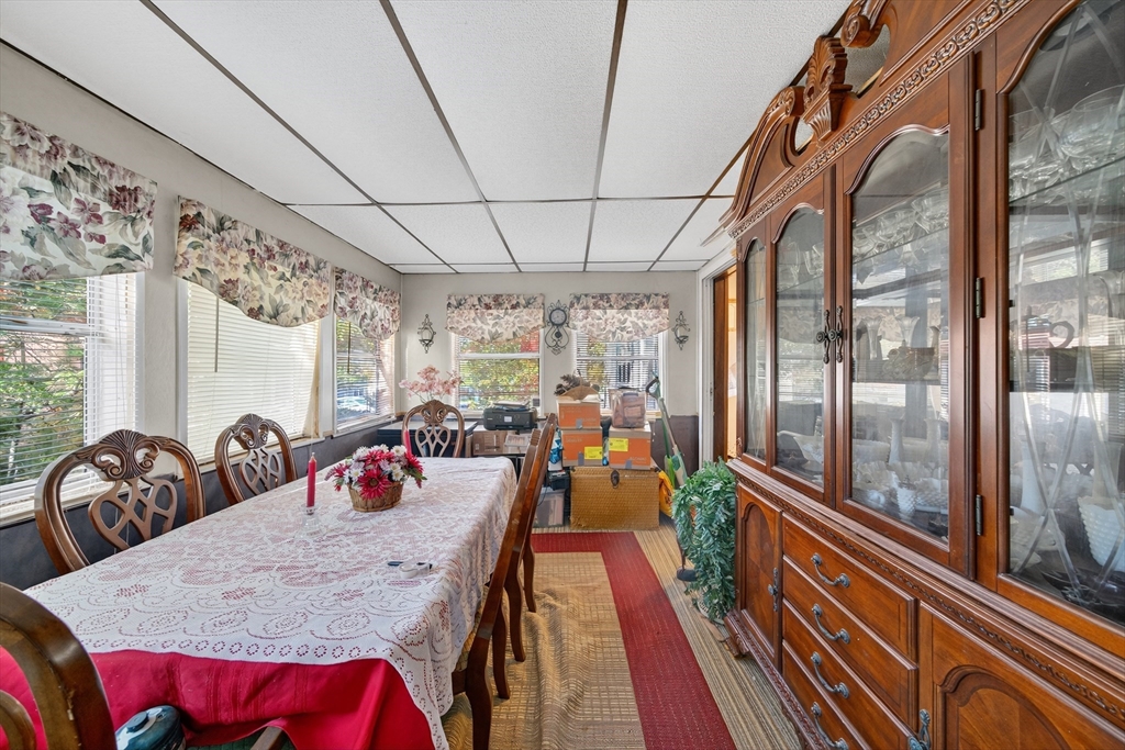 59 Timber Lane Wareham, MA 02576 - Photo 28 of 30 a view of a dining room with furniture window and outside view