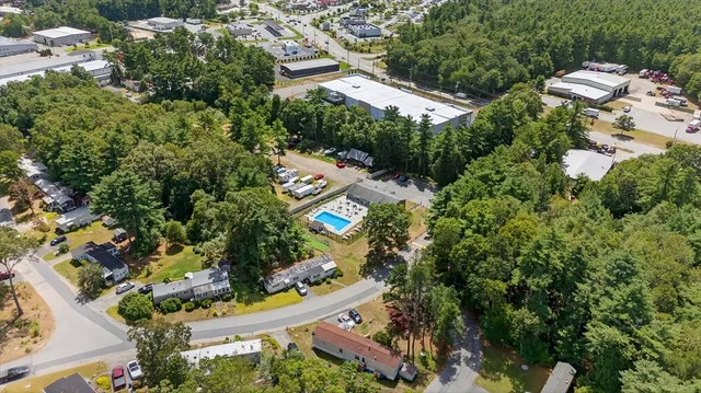 an aerial view of residential house with outdoor space