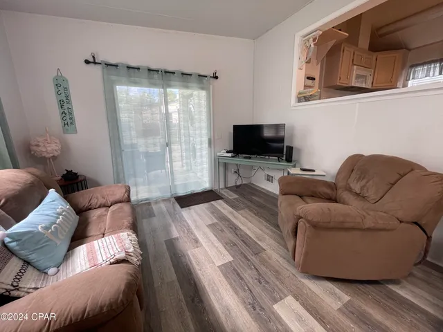 $1,600 | 1219 Thomas Drive, Unit 204, Panama City Beach, FL 32408