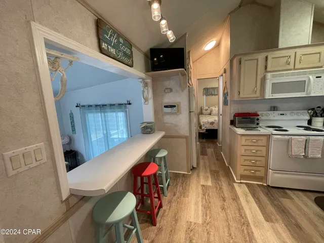 $1,600 | 1219 Thomas Drive, Unit 204, Panama City Beach, FL 32408