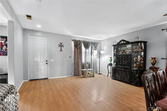 a bed room with a bed and furniture