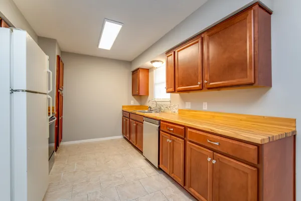 a bathroom with a sink a mirror and a bathtub