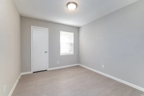 an empty room with a window