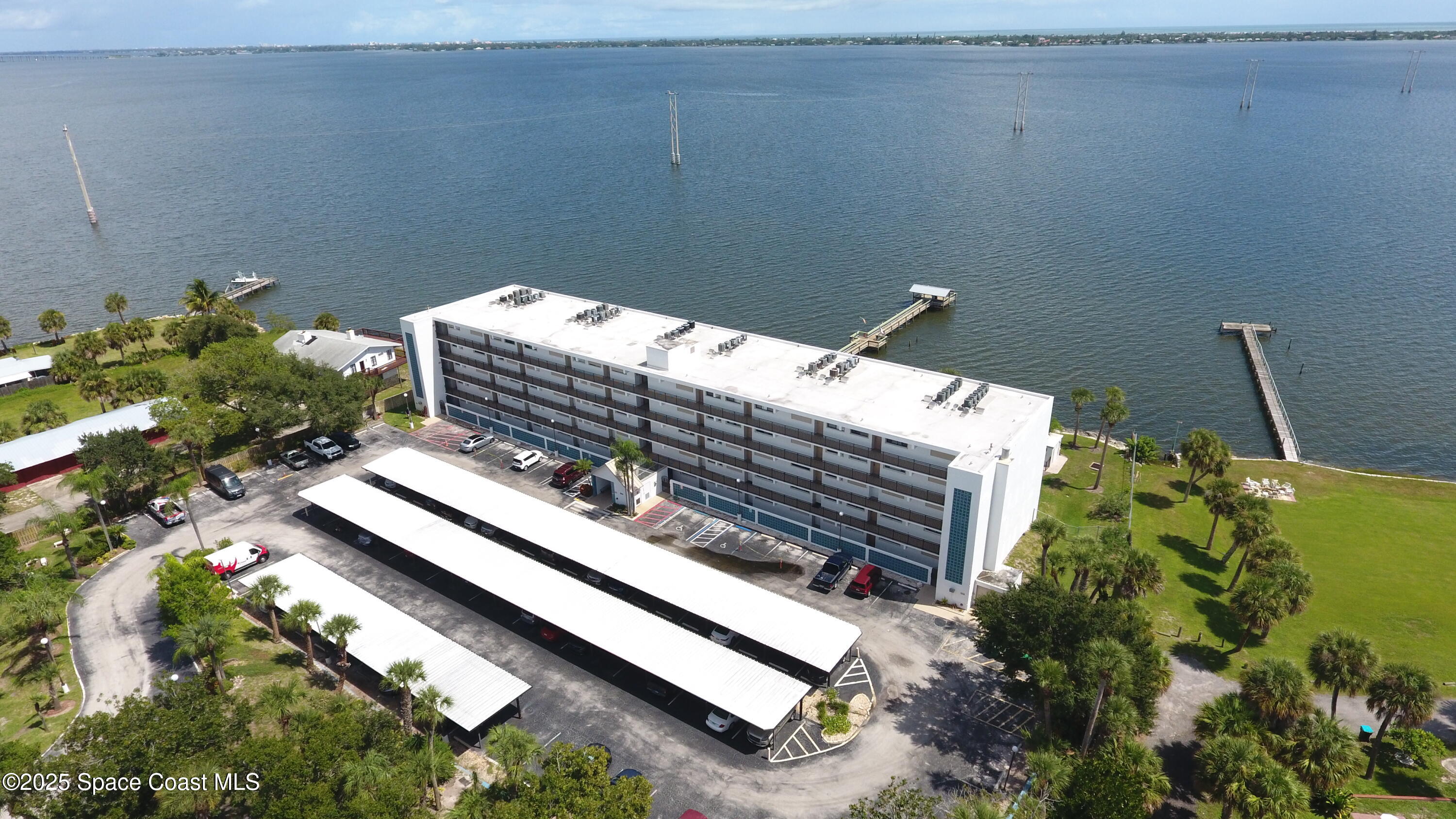 3901 Dixie Highway Northeast, Unit 402 Palm Bay, FL 32905 - Photo 14 of 33 a view of a balcony with two chairs