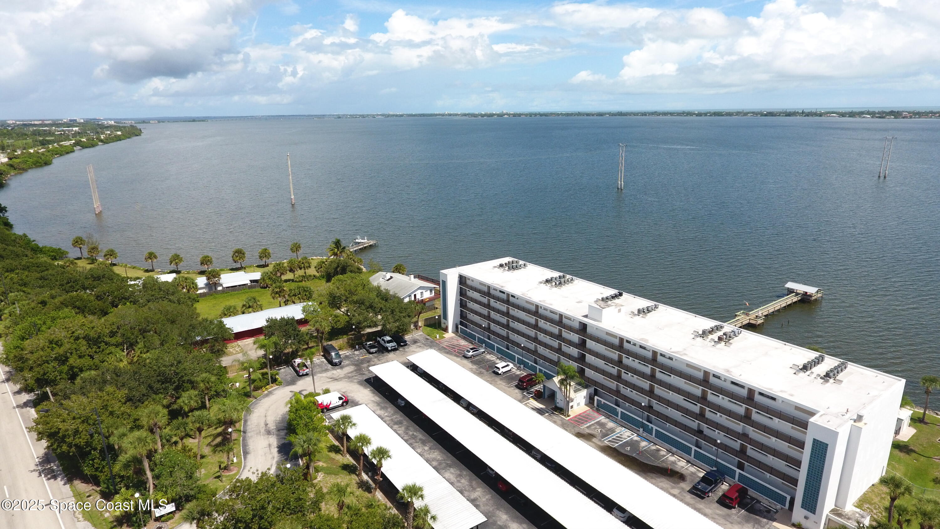 3901 Dixie Highway Northeast, Unit 402 Palm Bay, FL 32905 - Photo 15 of 33 a view of a balcony with an outdoor space