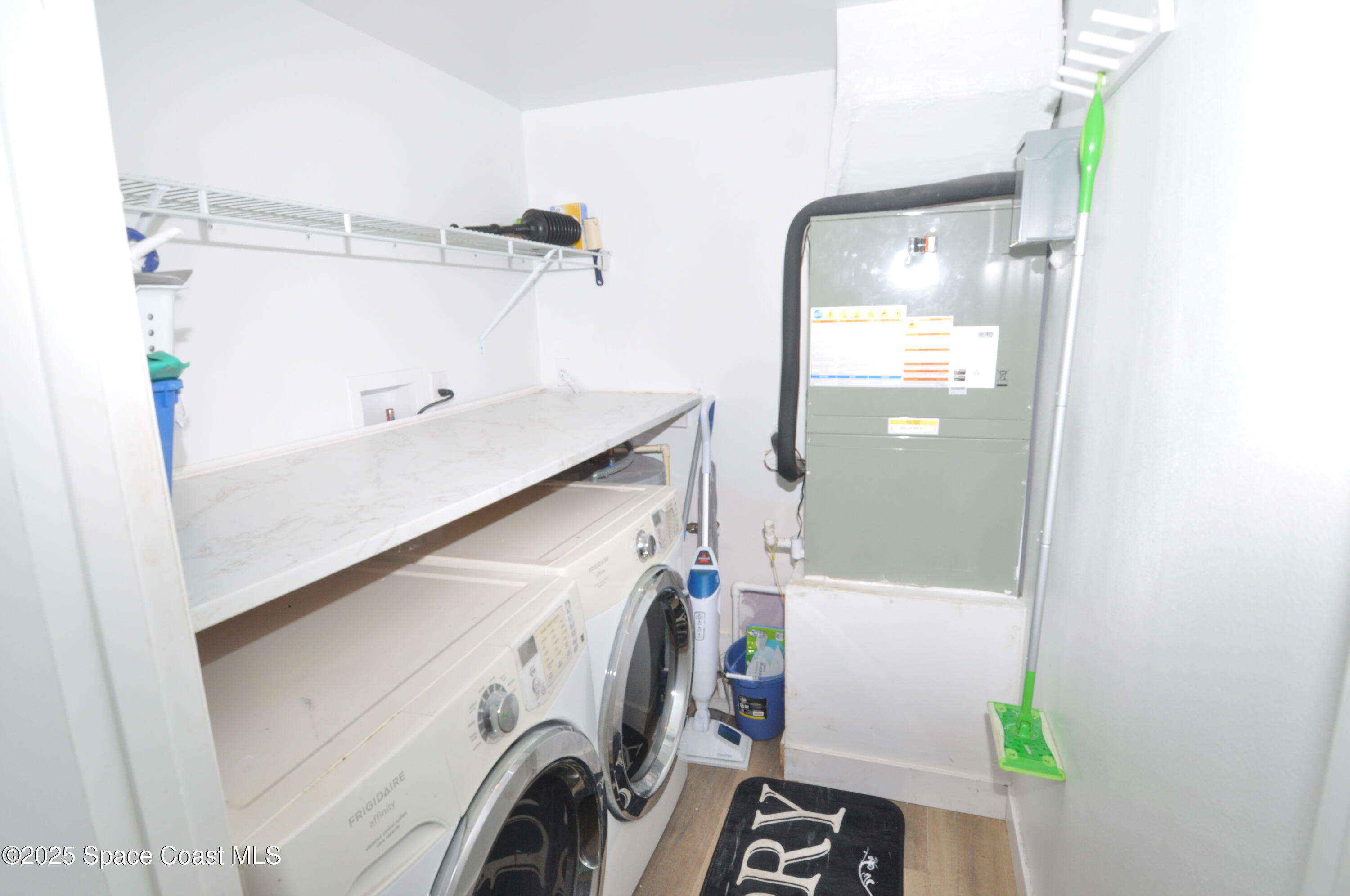 3901 Dixie Highway Northeast, Unit 402 Palm Bay, FL 32905 - Photo 30 of 33 a utility room with dryer and washer