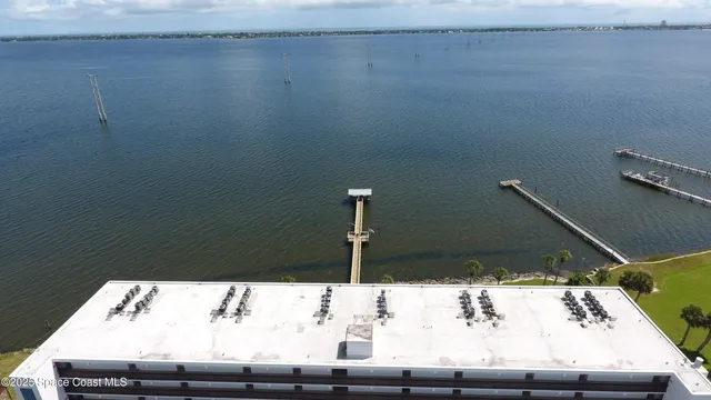 a view of a room with rack and wooden floor