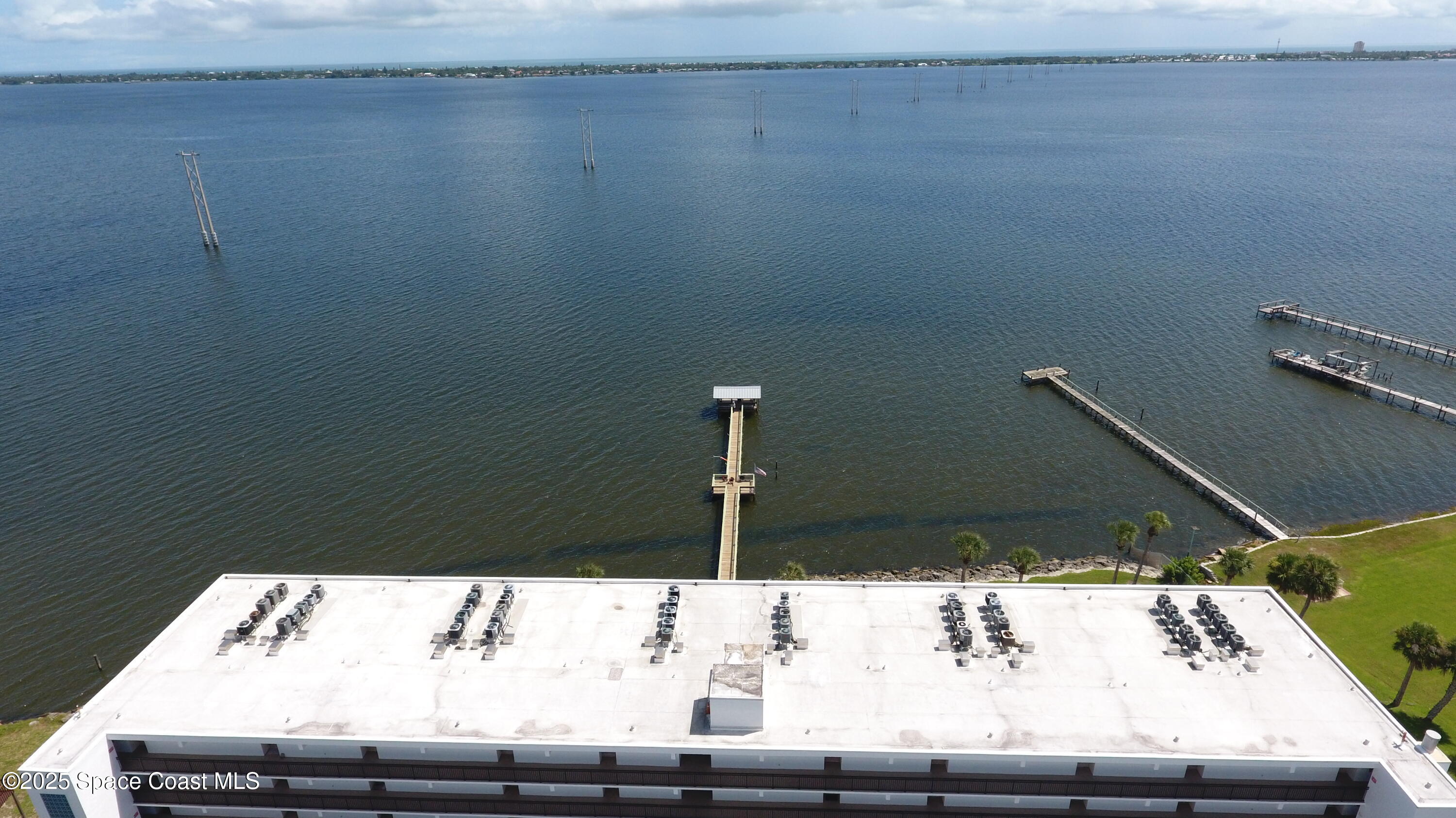 3901 Dixie Highway Northeast, Unit 402 Palm Bay, FL 32905 - Photo 9 of 33 a view of a room with rack and wooden floor