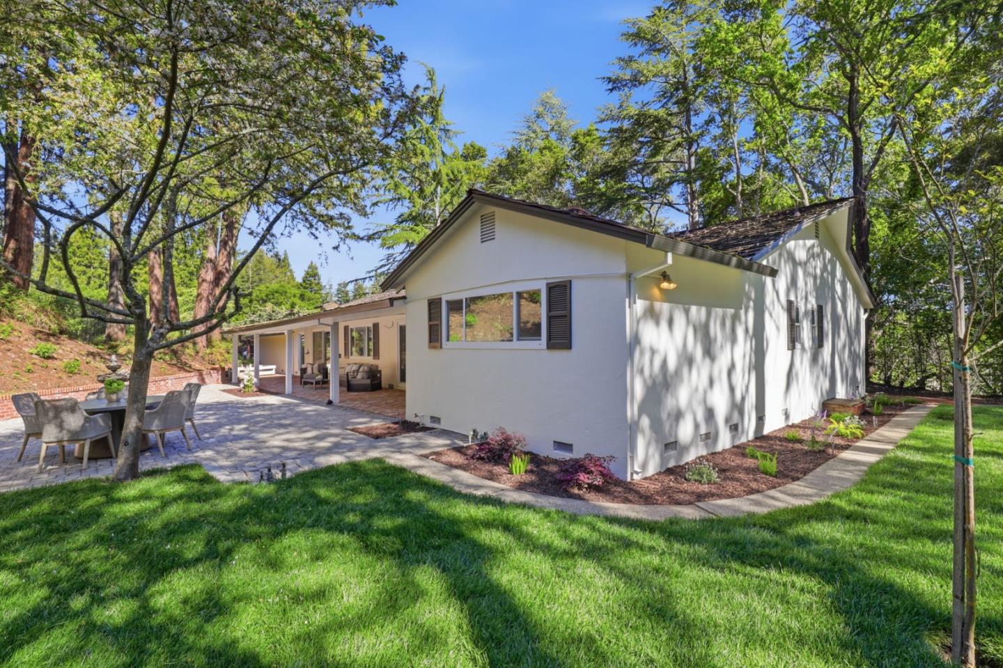 425 Summit Spring Road Woodside, CA 94062 - Photo 39 of 42 a front view of house with a garden