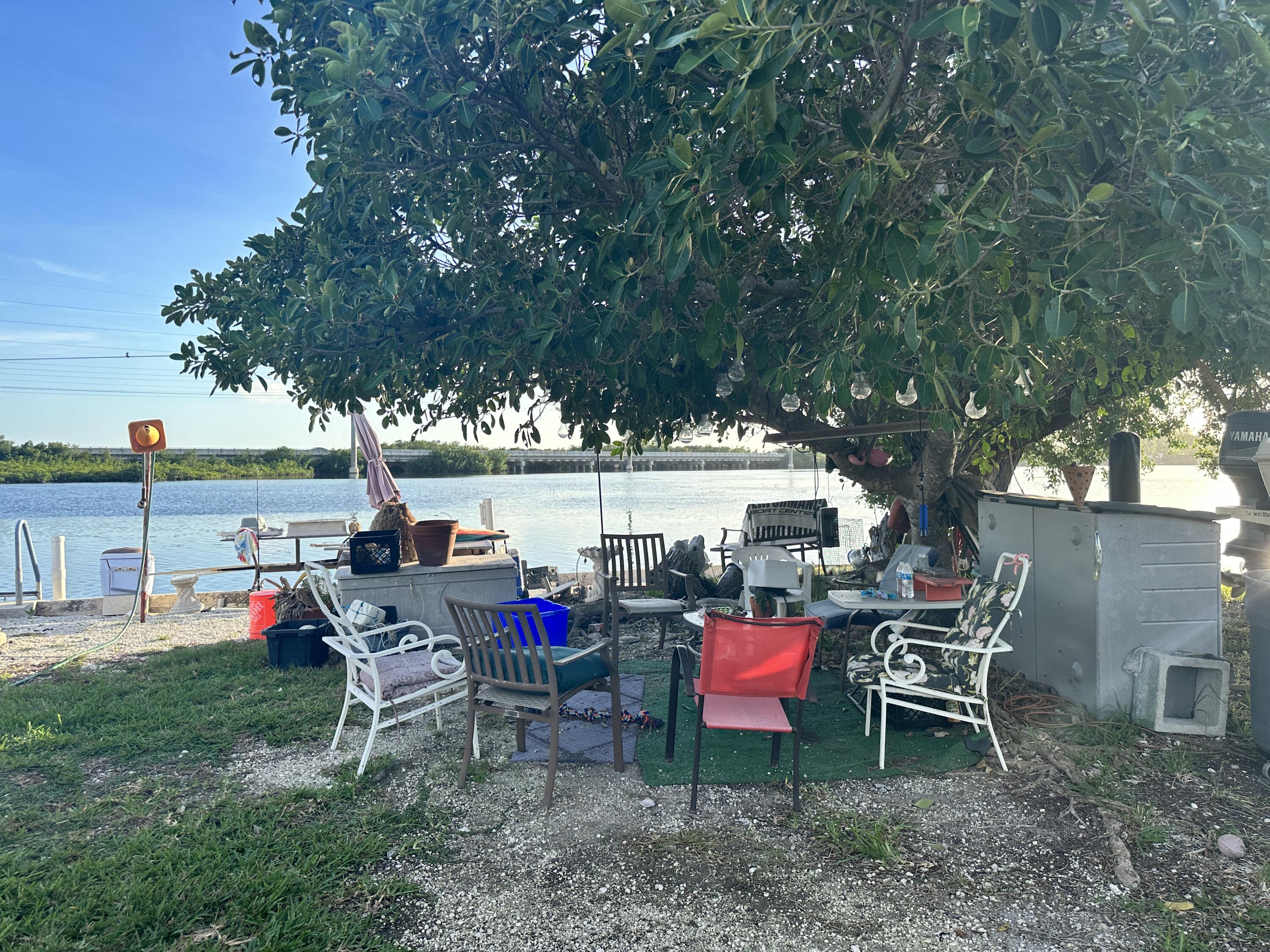 20 Shore Terrace Key West, FL 33040 - Photo 5 of 15 a view of a backyard with sitting area