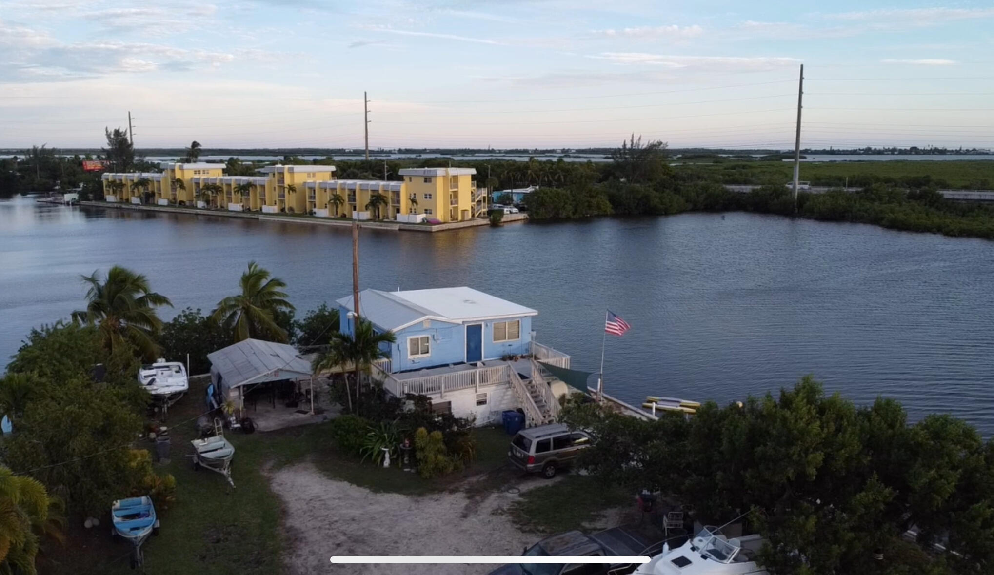 20 Shore Terrace Key West, FL 33040 - Photo 8 of 15 a view of a lake with a house and outdoor space