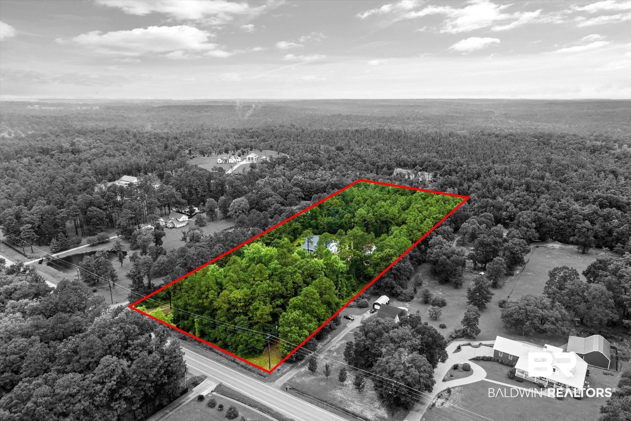 2300 Radcliff Road Saraland, AL 36571 - Photo 48 of 56 Aerial view of property and surrounding area with a forest and property boundaries highlighted
