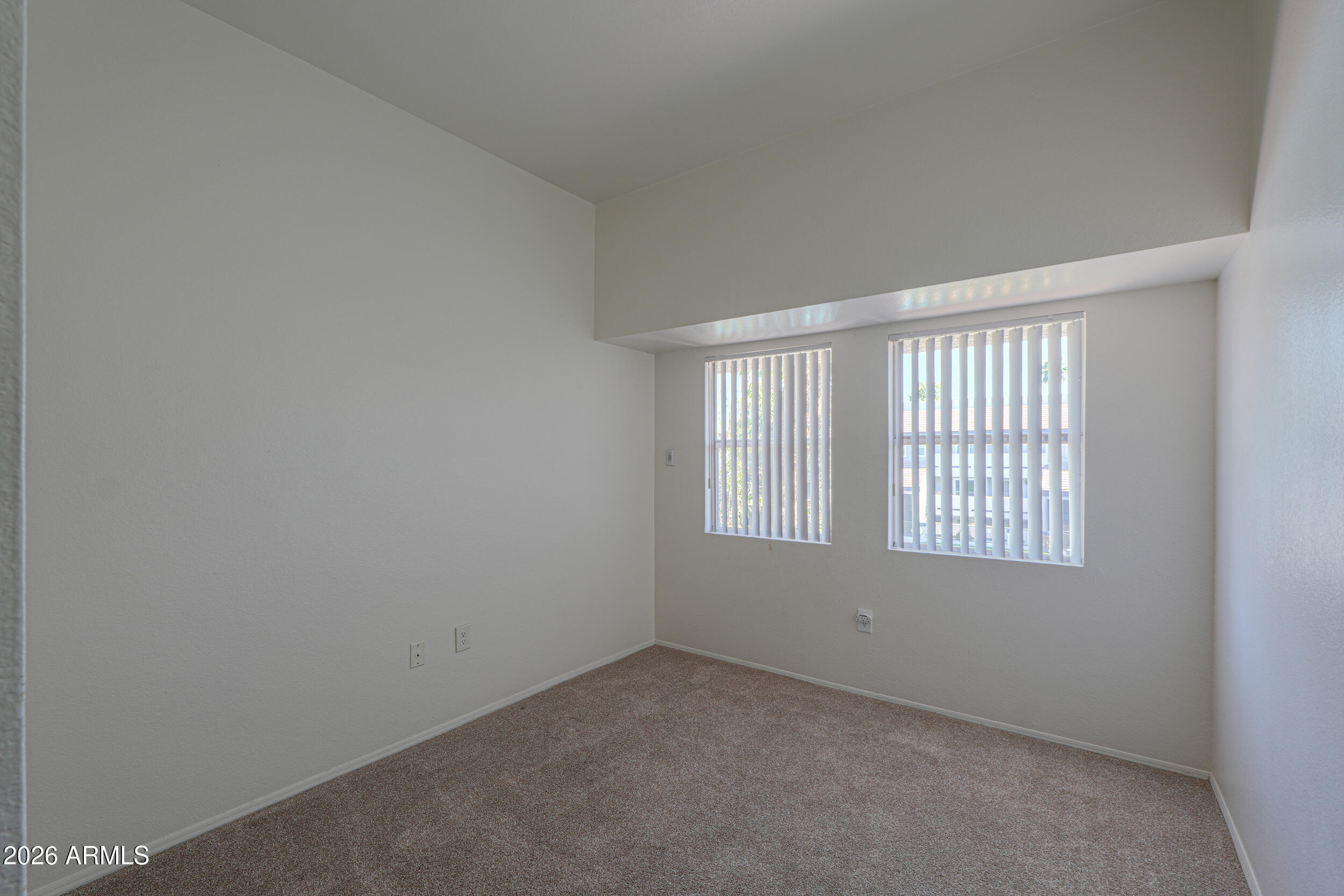 1331 West Baseline Road, Unit 225 Mesa, AZ 85202 - Photo 19 of 47 an empty room with a window