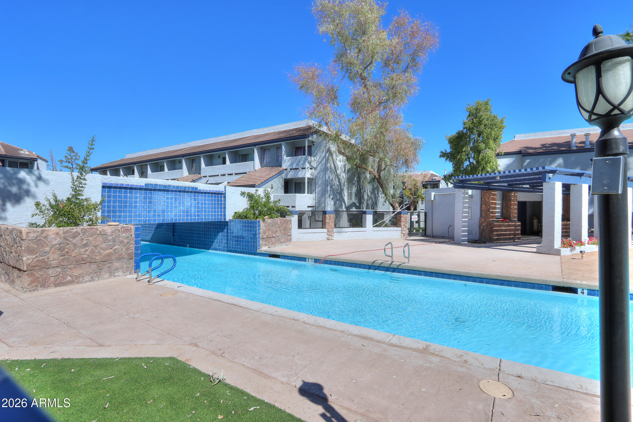 1331 West Baseline Road, Unit 225 Mesa, AZ 85202 - Photo 2 of 47 a view of house with outdoor space and entertaining space